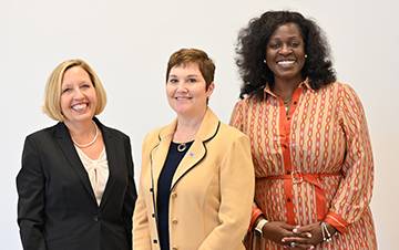 Left to right: Provost Joanne Russell, CUNY Executive Vice Chancellor & University Provost Wendy F. Hensel, President Claudia Schrader